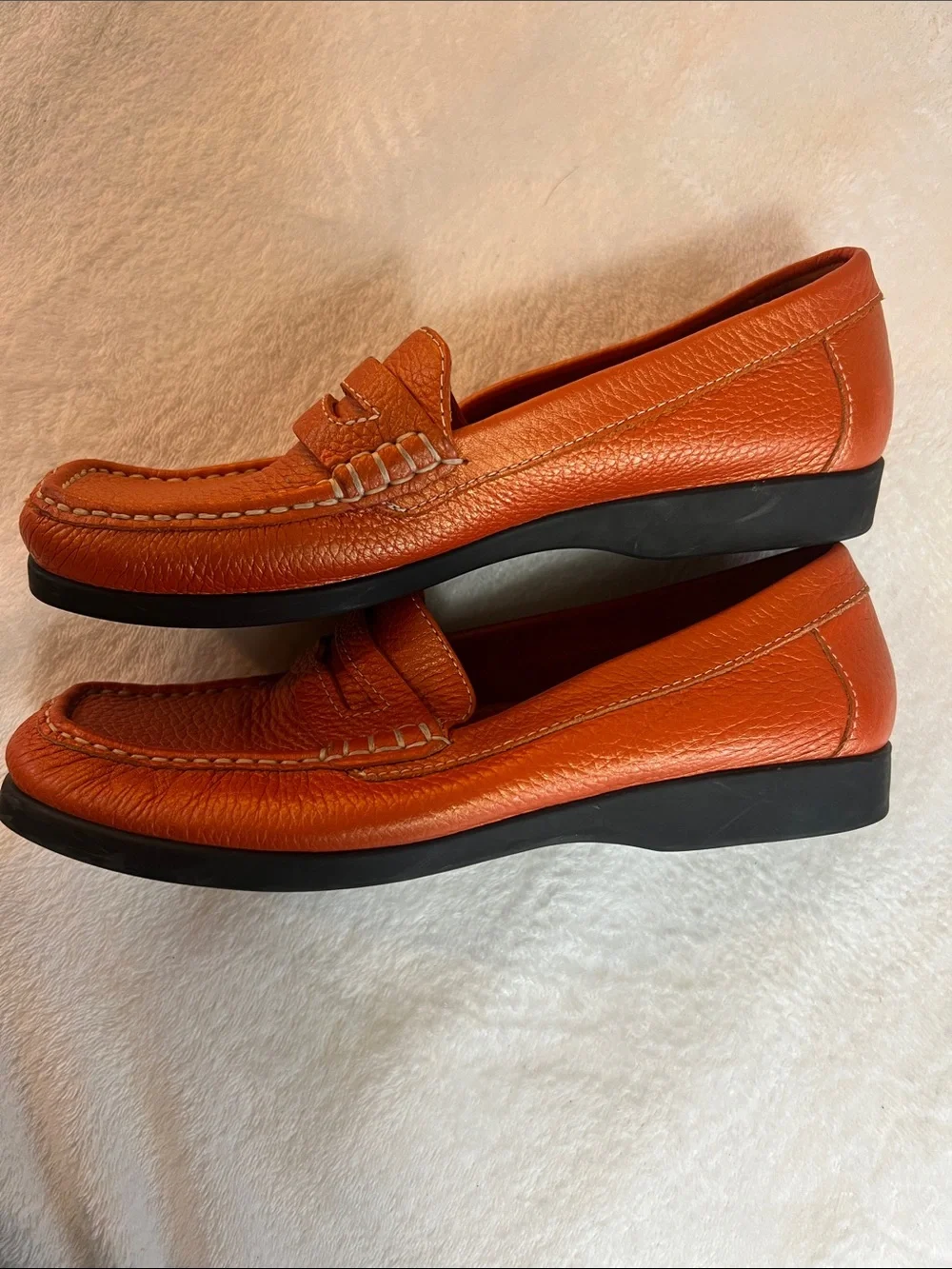 Rockport women’s orange pebbled leather square toe penny loafers
